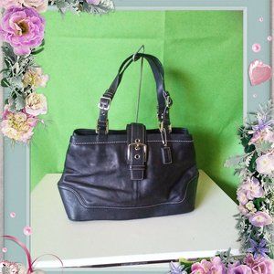 Black coach purse with white stitching